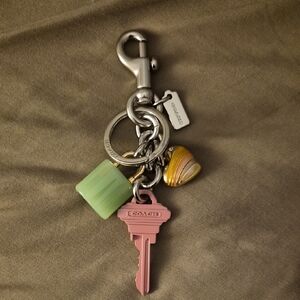 Coach Silver and Pink Keychain with Green and Gold Accents